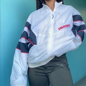 This starter windbreaker is a size Medium